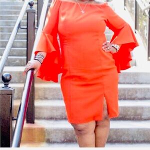 Nice off the shoulder orange cocktail dress.